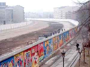 Berlin Wall: Barrier constructed by the German Democratic Republic, enclosing West Berlin
