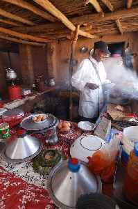 Cooking: Art of preparing food for consumption with the use of heat