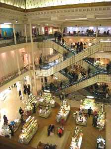 Department store: Retail establishment; building which offers a wide range of consumer goods