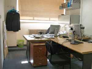 Office: Room where people perform their duties or a position within an organization