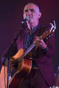 Paul Kelly (Australian musician): Australian rock music singer-songwriter, guitarist, and harmonica player