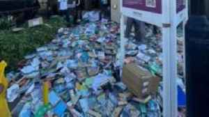 Library books dumped on pavement 'unacceptable'