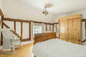 Thatched cottage oozing with 'historical charm' for sale in village with highly-successful school