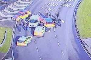 Police chase armed man down motorway in high-speed pursuit