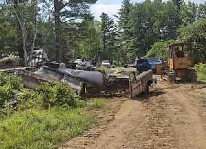 1957 Chevy Crumbles While Being Towed out of Junkyard, It Probaly Won't Wax Right Out