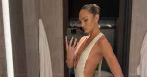 Candice Swanepoel Goes Braless in Plunging White Sequin Gown: Photos