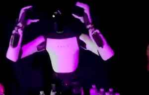 Tesla’s Optimus Robot Appears to Remove Headset Before Falling Over