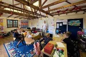 Millionaire dad builds £150k mini-school in garden and employs two teachers for his children