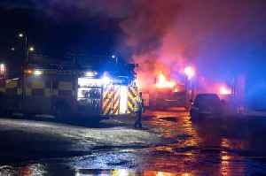 Firefighters tackle huge blaze at bus depot in Scots town as cops lock down area