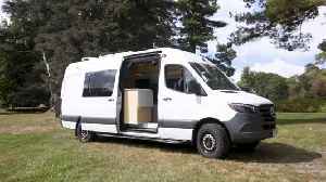 This Camper Van Is a Bespoke Home on Wheels With a Compact Workspace and a Clean Design