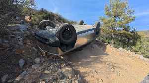 Tesla Cybertruck with no brakes flips over on an off-road trail, needs diesel-powered help