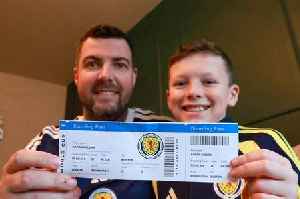 Heartwarming footage shows moment schoolboy erupts with joy as he opens gift of 