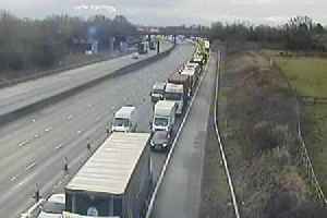 Police hunt lorry driver who fled scene of horror motorway crash that left two boys seriously injured