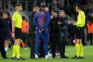 Barcelona game stopped for 'medical emergency' as players leave pitch with cops in stand