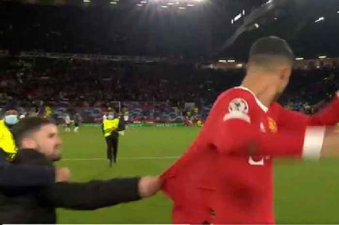 Cristiano Ronaldo chased down by crazed fan before stewards wipe him out at last second