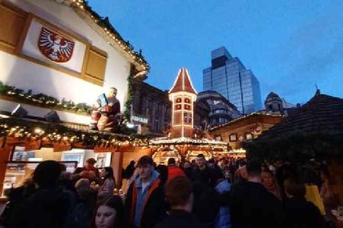 What it's like walking through the German Market at twilight from steel drums to steins, pedlars and preachers