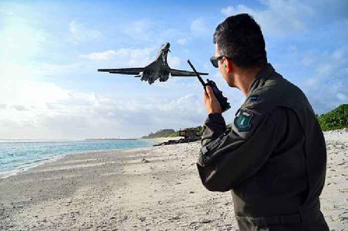 B-1B Lancer Shows Underbelly Flying Over a Beach, Not Something You See Every Day