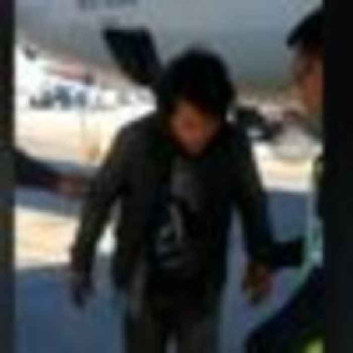 Shocking moment stowaway found after American Airlines flight