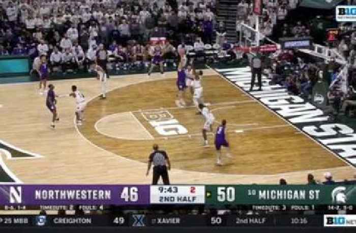 
					Northwestern’s Ryan Young hits the hookshot as time expires against Michigan State
				