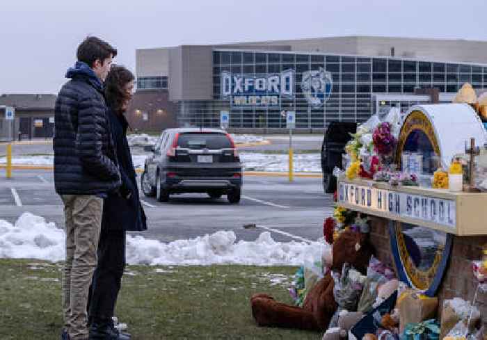 Terrorism charge in Michigan school shooting sparks debate
