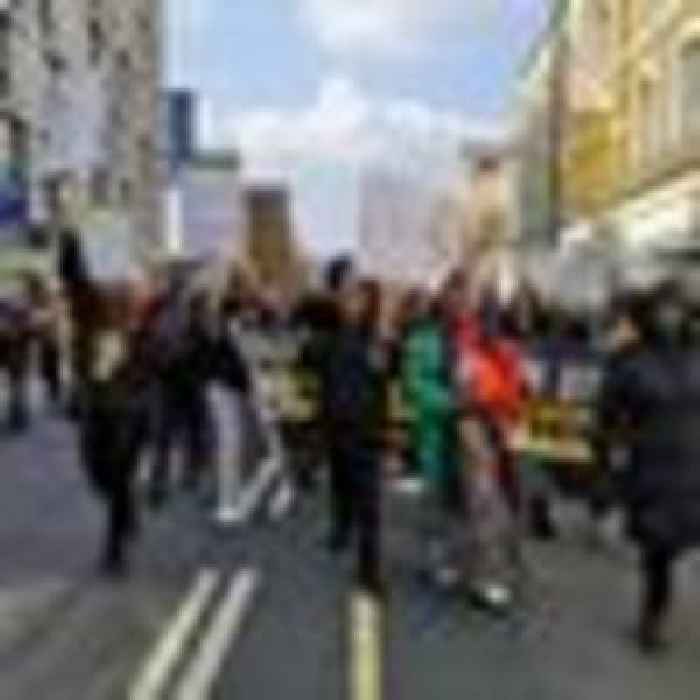 'Shame on you': Hundreds of protesters in march for schoolgirl, 15, strip-searched while on period
