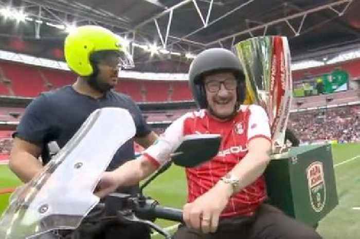 Paul Chuckle delights fans after riding Papa John's scooter at EFL Trophy final