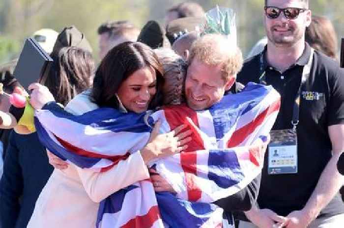 Prince Harry and Meghan Markle hug British Invictus Games star after 'dig' at royals