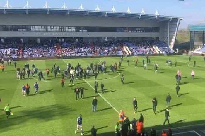 Oldham fans raid pitch to delay becoming first ex-Prem club relegated to non-league
