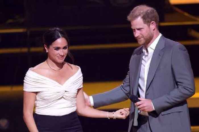 Body language expert claims Meghan Markle 'pushes' Harry away during embrace at Invictus games