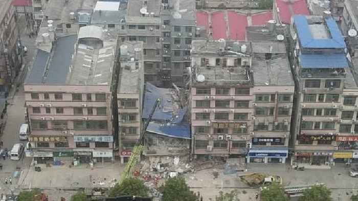 Police Arrest 9 After Building Collapses In Central China