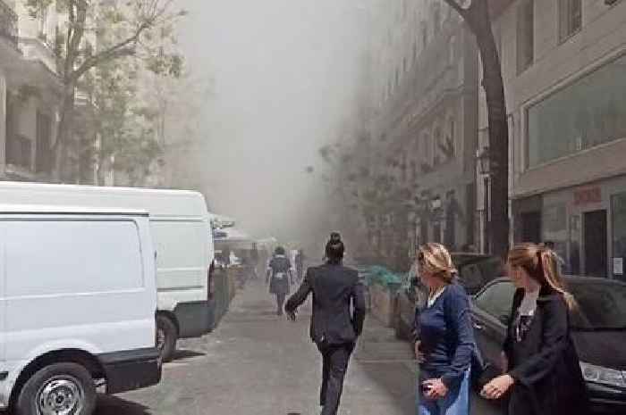 Madrid building explosion leaves firefighters trying to free people from rubble