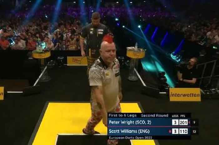 Darts fans left worried as Peter Wright is beaten by player who is ‘not a professional’