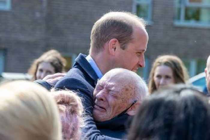 Prince William hugs sobbing elderly man as he breaks royal protocol