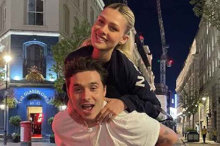 Brooklyn Beckham and new wife Nicola spark pregnancy rumours as they enjoy rainy trip to London