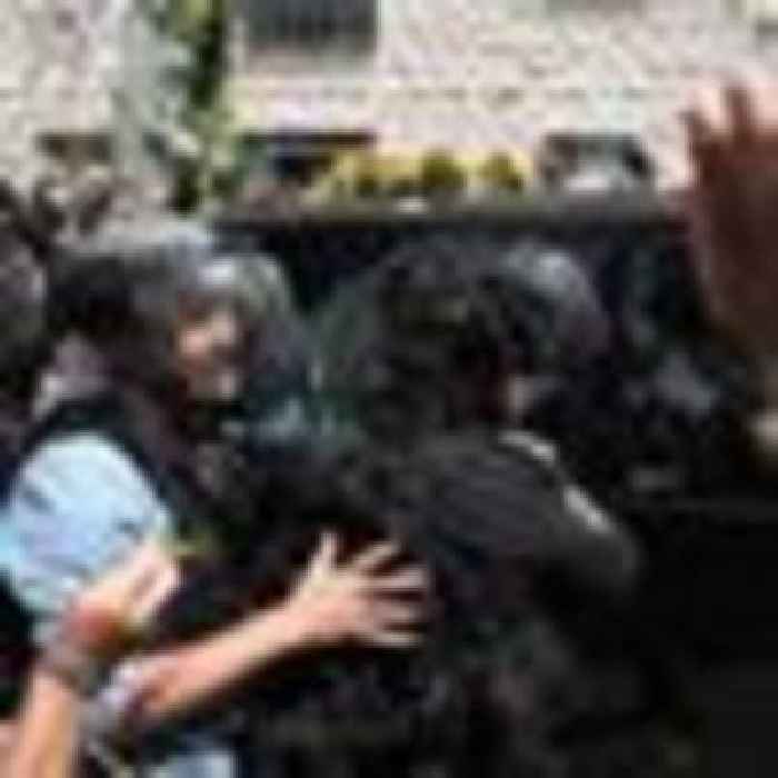 Clashes between Israeli police and Palestinian mourners at funeral of Al Jazeera journalist