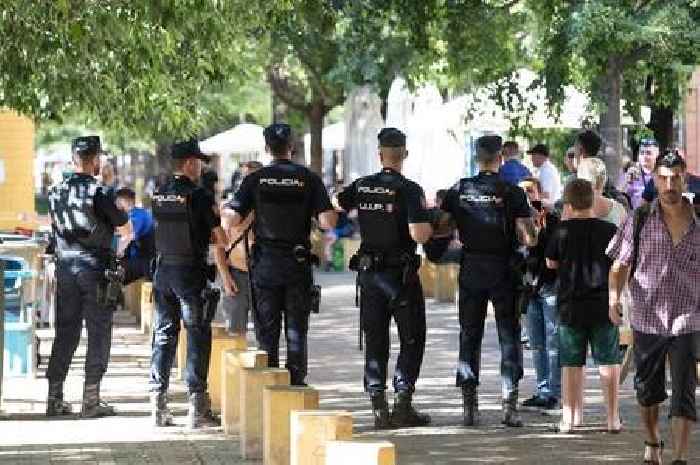 Rangers fans party in Seville under watchful eye of Spanish riot cops