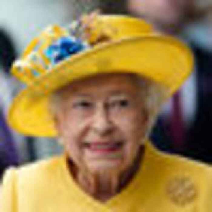 Queen makes surprise appearance to mark new rail line