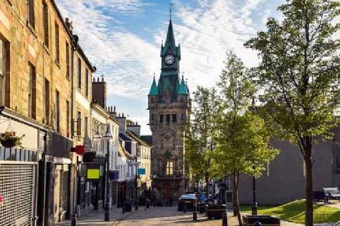 What defines a city and how is it decided as Dunfermline awarded new status