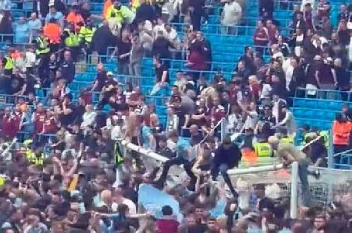 Man City fans snap crossbar as raucous pitch invasion after Premier League win goes wrong