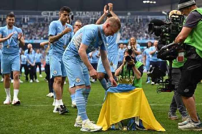 Oleksandr Zinchenko wraps Premier League trophy in Ukraine flag in tearful moment