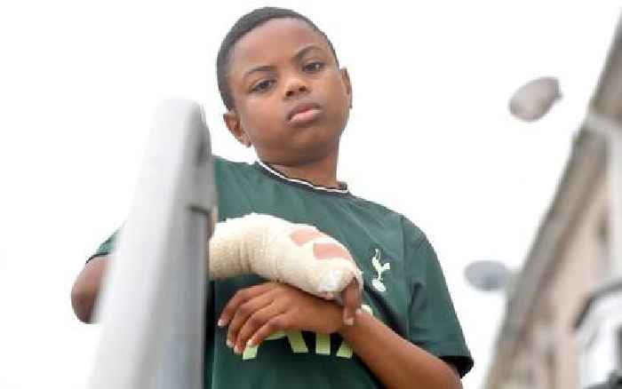 School shuts as boy loses finger after climbing fence 'to escape bullies'