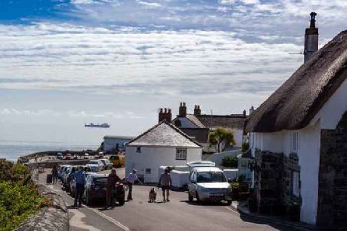 Another ship pictured 'floating' in the clouds off the coast of Coverack