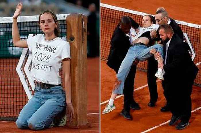 Female tennis court invader straps herself to net at French Open and says '1028 days left'