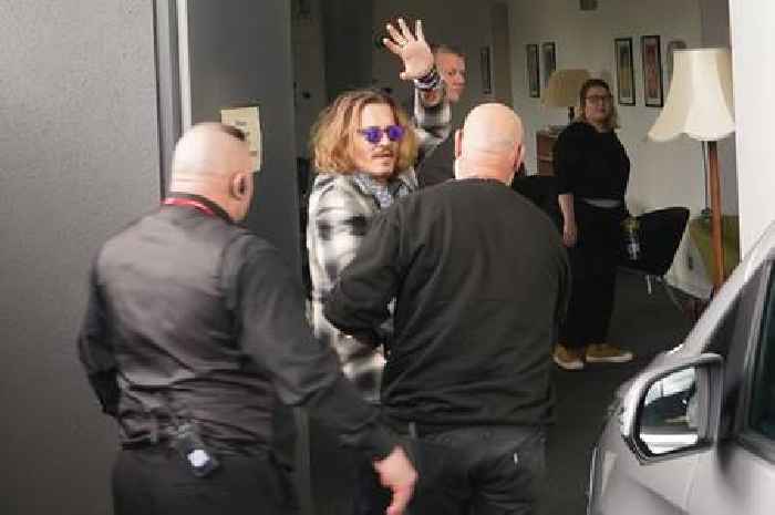 Johnny Depp rushed away in car as he is mobbed by over 200 excitable fans after Gateshead gig
