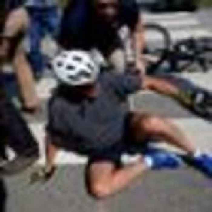 'I got my foot caught': Biden falls while getting off his bike after beach ride