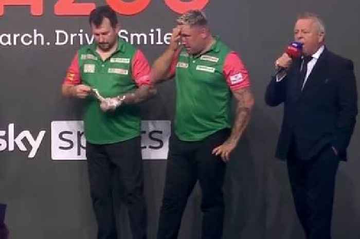Gerwyn Price removes medal and pockets it after shock World Cup of Darts defeat
