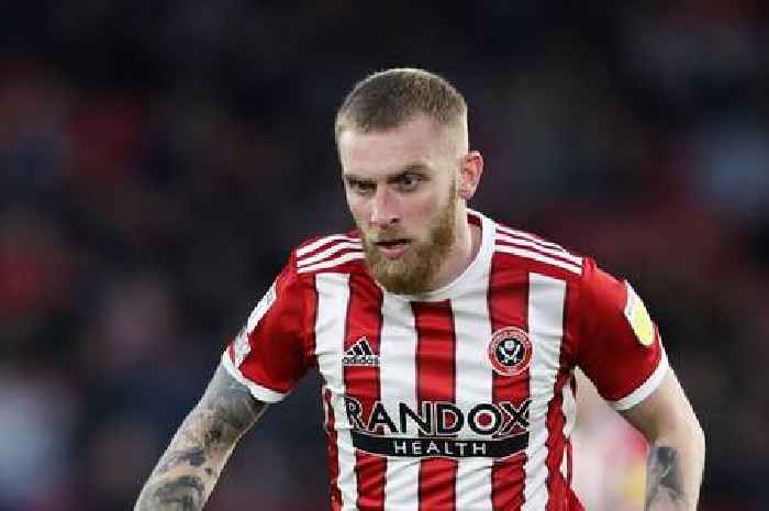 Scotland star Oli McBurnie and Sheffield United teammate charged with assault after pitch invasion