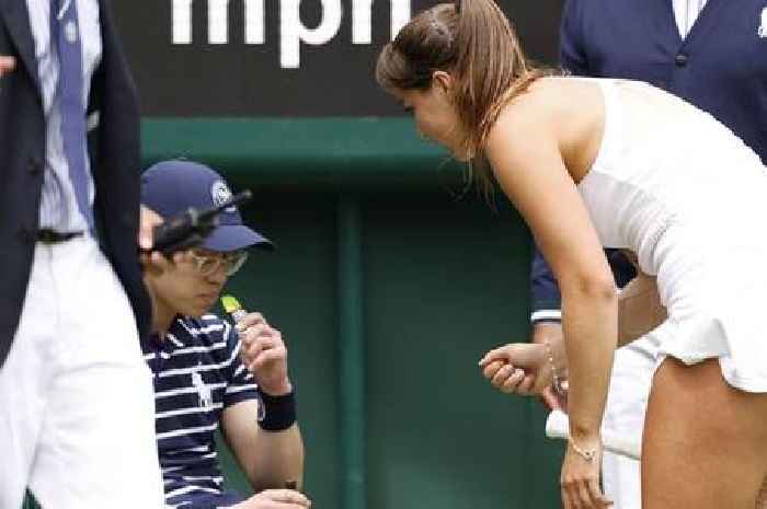 British number five Jodie Burrage gives ballboy Percy Pig sweets after he faints at Wimbledon