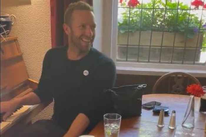 Coldplay frontman Chris Martin entertains pub customers after partying at Glastonbury