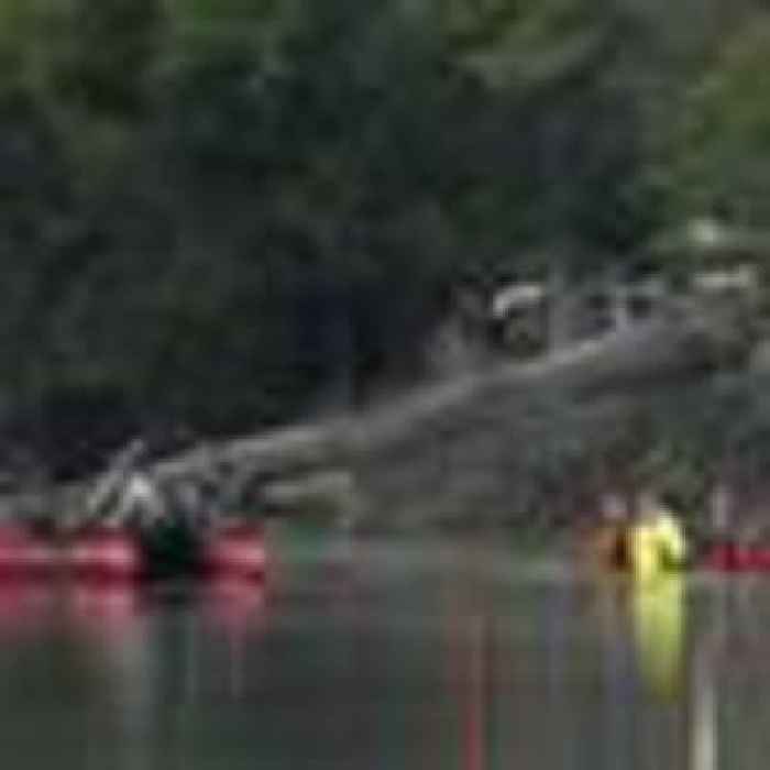Bodies of three missing children, woman found in Minnesota lake